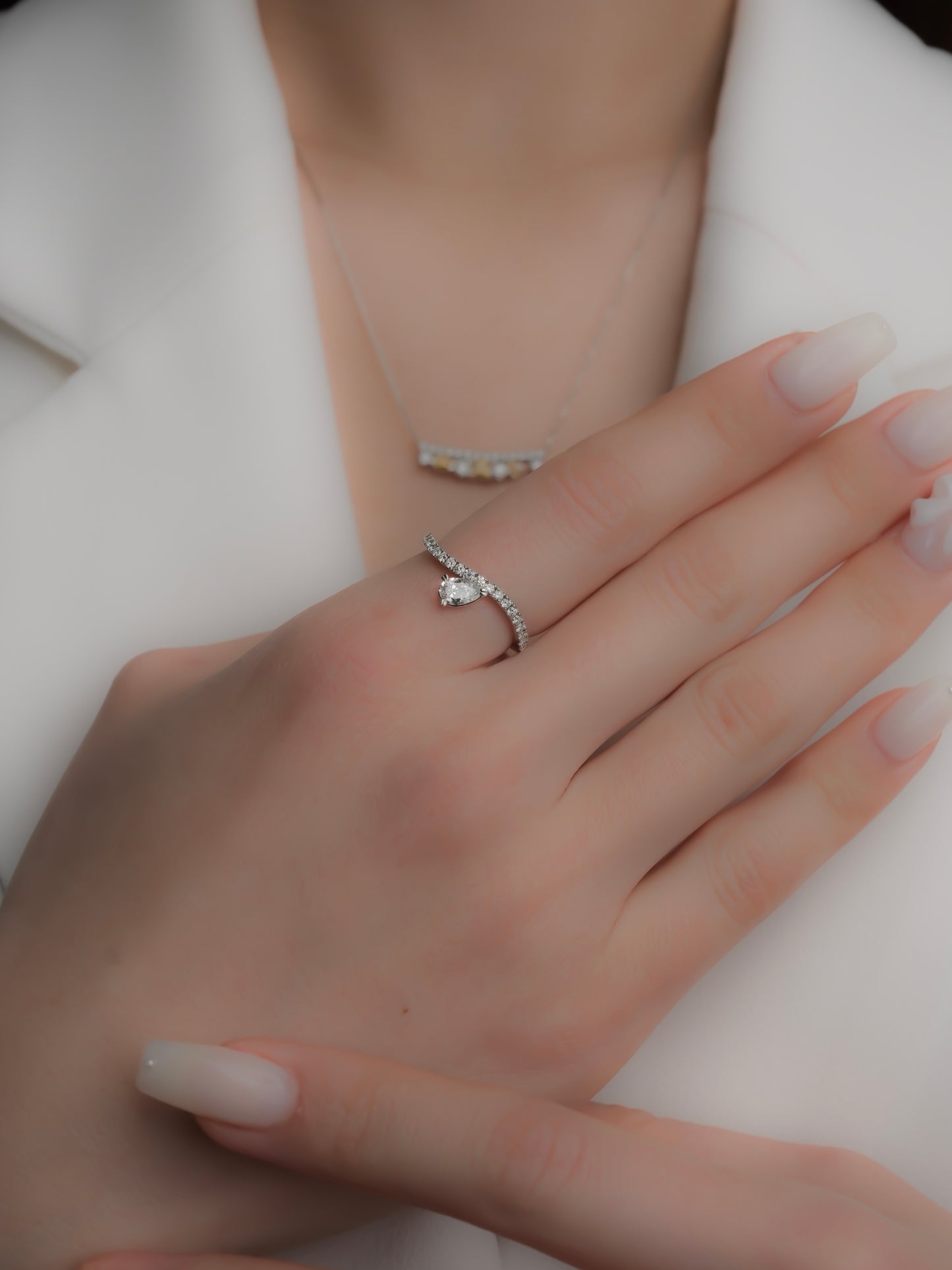 PEAR SHAPE DIAMOND WAVE RING PT950