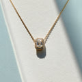 K18 EMERALD CUT DIAMOND HALO NECKLACE